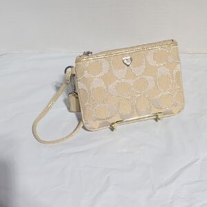 Coach Gold Wristlet with Heart Charm